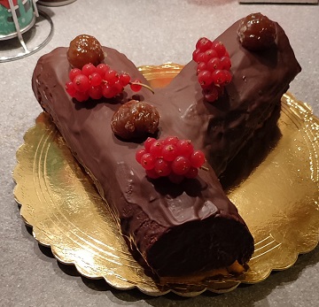 Bûche de Noël ai marrons glacés e cioccolato